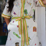 MINIVESTIDO COM ESTAMPADO GRÁFICO VINTAGE E CINTO DE ATAR