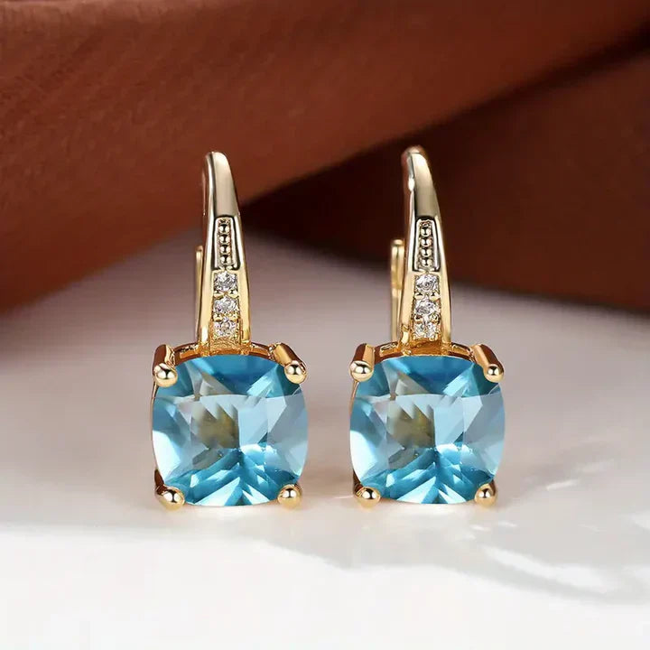 Brincos de Ouro com Pedras Misteriosas