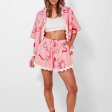 CONJUNTO DE CAMISA E CALÇÕES COM DETALHE ONDULADO