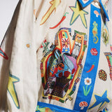 MINIVESTIDO COM PADRÃO TROPICAL E CINTO