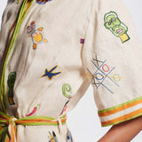 MINIVESTIDO COM ESTAMPADO GRÁFICO VINTAGE E CINTO DE ATAR
