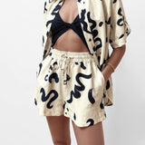 CONJUNTO DE DUAS PEÇAS COM ESTAMPADO ABSTRATO DE PINCELADAS