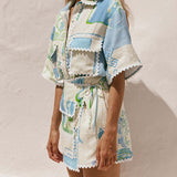 CONJUNTO ESTAMPADO COM SAIA CRUZADA
