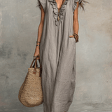 Vestido maxi boémio sem mangas com decote em V e caimento fluido