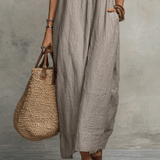 Vestido maxi boémio sem mangas com decote em V e caimento fluido
