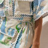 CONJUNTO ESTAMPADO COM SAIA CRUZADA