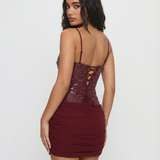 VESTIDO MINI DE LANTEJOULAS COM COSTAS DE ESPARTILHO