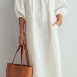 Vestido midi creme de corte relaxado