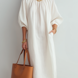 Vestido midi creme de corte relaxado
