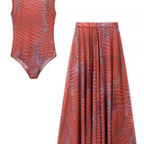CONJUNTO DE SAIA E BODY TRANSLÚCIDO
