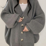 Página | Cardigan longo com botões para mulher | Moderno