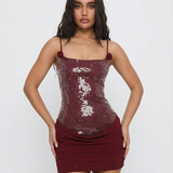 VESTIDO MINI DE LANTEJOULAS COM COSTAS DE ESPARTILHO