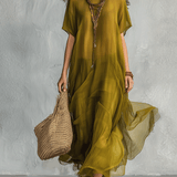 Vestido maxi boémio verde oliva com silhueta drapeada
