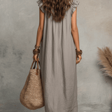 Vestido maxi boémio sem mangas com decote em V e caimento fluido